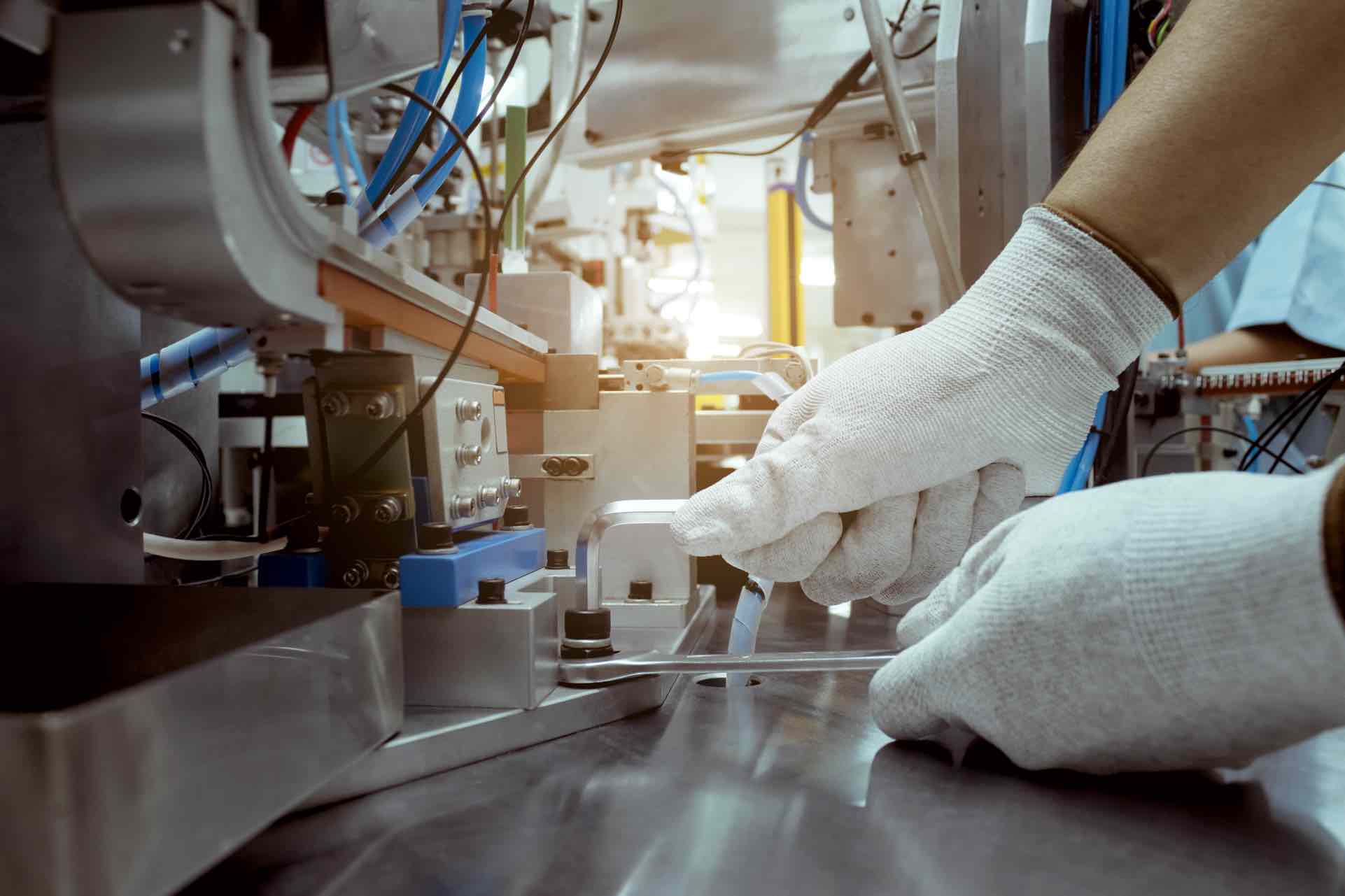 Technician servicing medical equipment